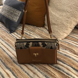 The matching blue bag set is by Spartina 449